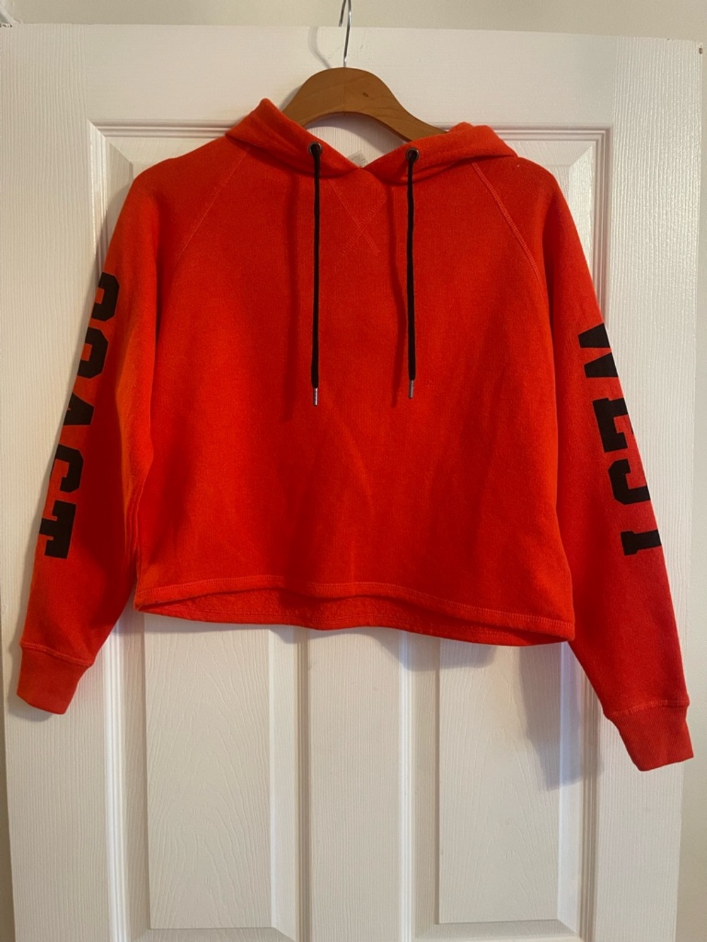 Orange Hooded Women's Cropped Sweatshirt with Sleeve Logo